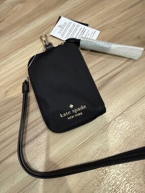 NWT. Kate Spade black and gold nylon cardholder wristlet